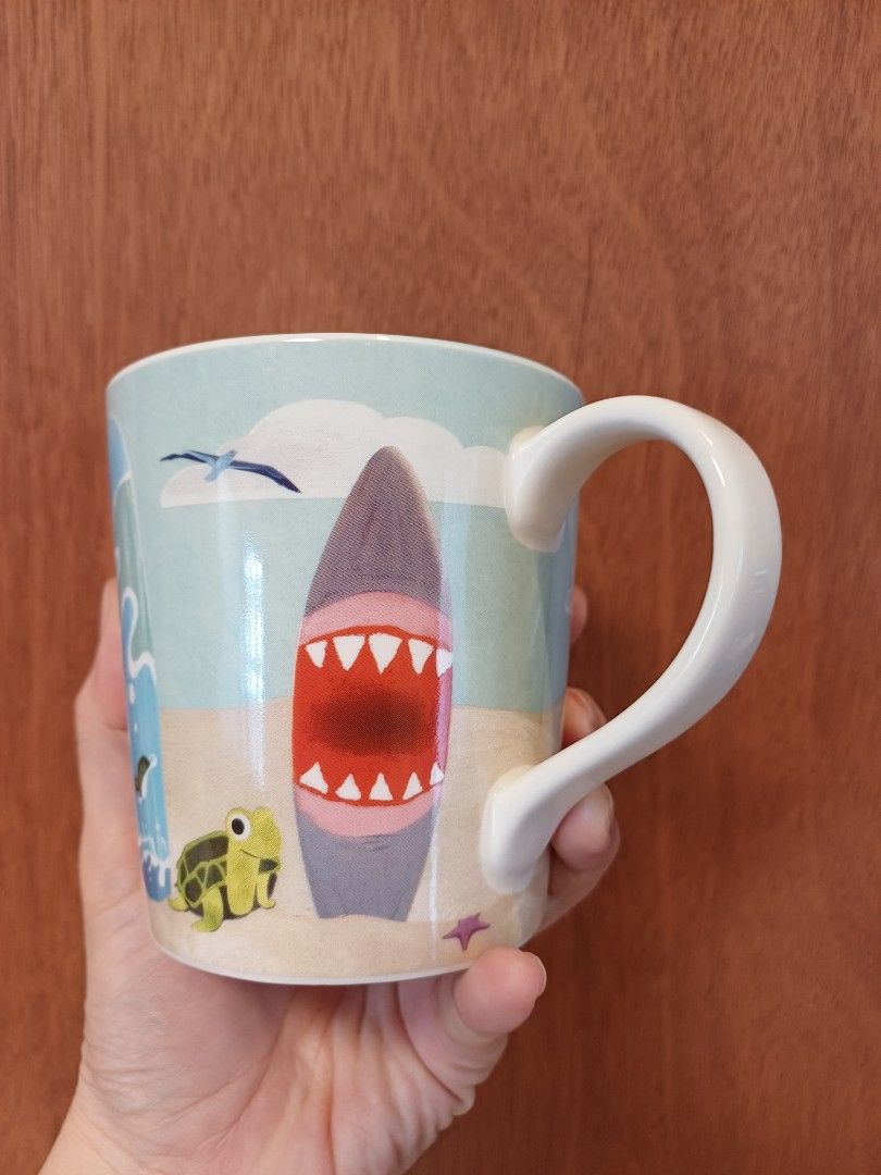 Starbucks Hawaii 2010 Surfboard Design Mug (Category: Coffee & Tea Tableware) located in Quezon City. Submitted by jal_c (Listing ID 1439927003, Image 3). Description: - Authentic Starbucks mug - Fun Hawaiian surf theme - Features surfboards, shark, turtle, and seagull designs - Cool blue interior - Ideal for collectors or beach enthusiasts sf/df c/o buyer.