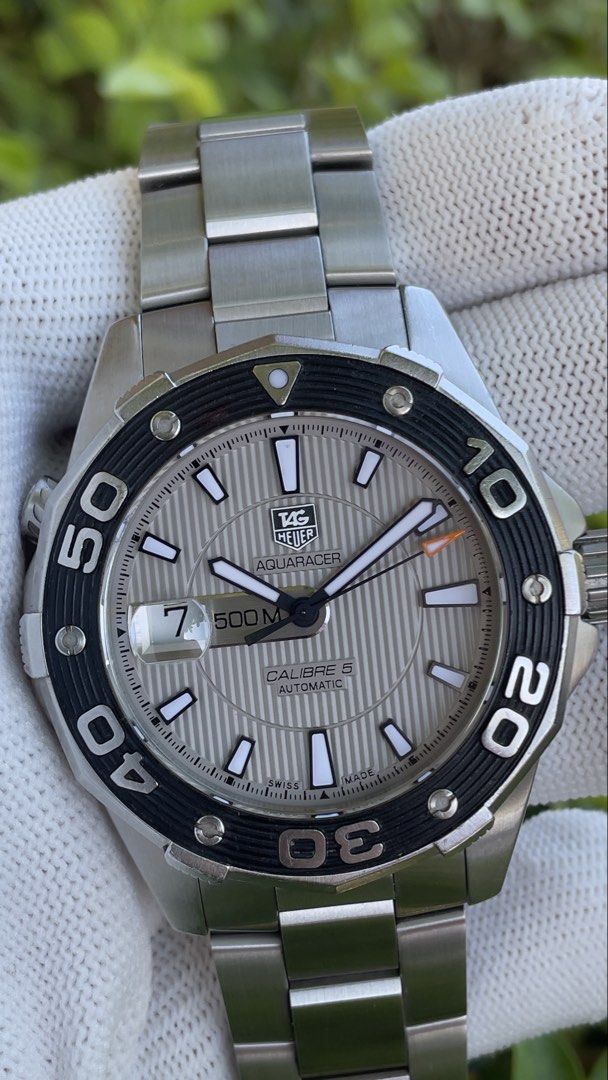 TAG Heuer Aquaracer WAJ2111 Automatic (Category: Men's Watches) located in Imus. Submitted by WellWatchesss (Listing ID 1439818040, Image 2). Description: TAG Heuer Aquaracer WAJ2111 43mm Calibre 5 Automatic Silver Dial Unpolished Set Supplied With Travel Case Only Can Fit Large Wrist Price: ₱70k.