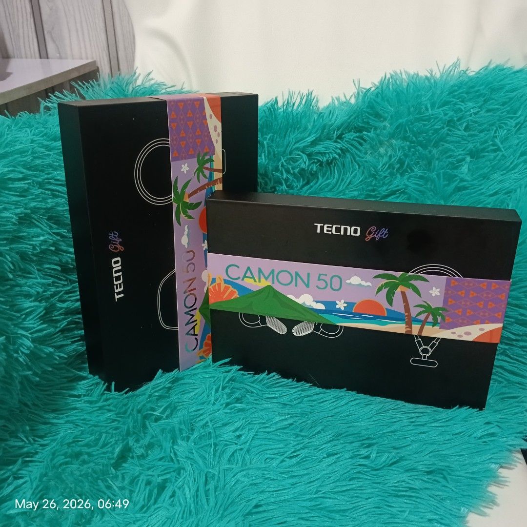 TECNO CAMON 50 Gift Box with Earphones (Category: Earphones) located in Quezon City. Submitted by mackyisa17. (Listing ID 1439990212, Image 1). Description: - Unbox a stylish TECNO CAMON 50 gift set. - Includes sleek black in-ear earphones. - Features a vibrant green braided cable. - Comes with a convenient carrying case. - Perfect for music lovers on the go..