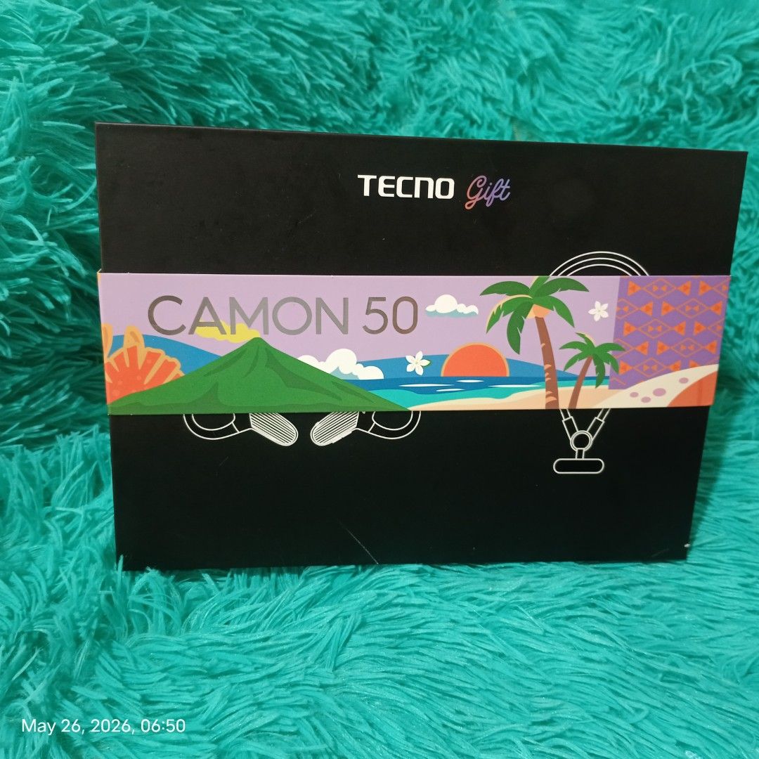 TECNO CAMON 50 Gift Box with Earphones (Category: Earphones) located in Quezon City. Submitted by mackyisa17. (Listing ID 1439990212, Image 2). Description: - Unbox a stylish TECNO CAMON 50 gift set. - Includes sleek black in-ear earphones. - Features a vibrant green braided cable. - Comes with a convenient carrying case. - Perfect for music lovers on the go..