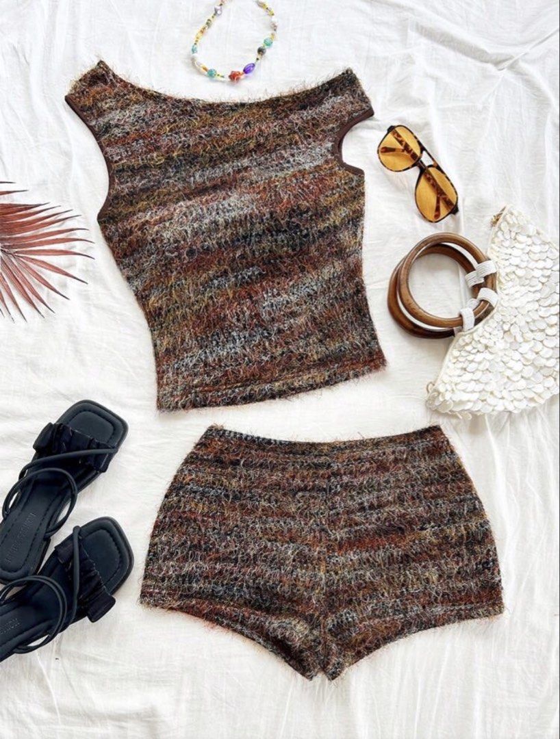 Textured Knit Crop Top and Shorts Set (Category: Sets or Coordinates) located in Quezon City. Submitted by juniasgarden (Listing ID 1439924103, Image 1). Description: - XS - used twice only - bought it for ₱429 - Trendy textured knit set - Includes sleeveless crop top and matching high-waisted shorts - Unique fuzzy yarn in brown, rust, and cream tones - Stylish and eye-catching design - Ideal for casual outings or beach vacations.