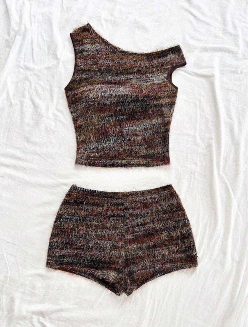 Textured Knit Crop Top and Shorts Set (Category: Sets or Coordinates) located in Quezon City. Submitted by juniasgarden (Listing ID 1439924103, Image 2). Description: - XS - used twice only - bought it for ₱429 - Trendy textured knit set - Includes sleeveless crop top and matching high-waisted shorts - Unique fuzzy yarn in brown, rust, and cream tones - Stylish and eye-catching design - Ideal for casual outings or beach vacations.