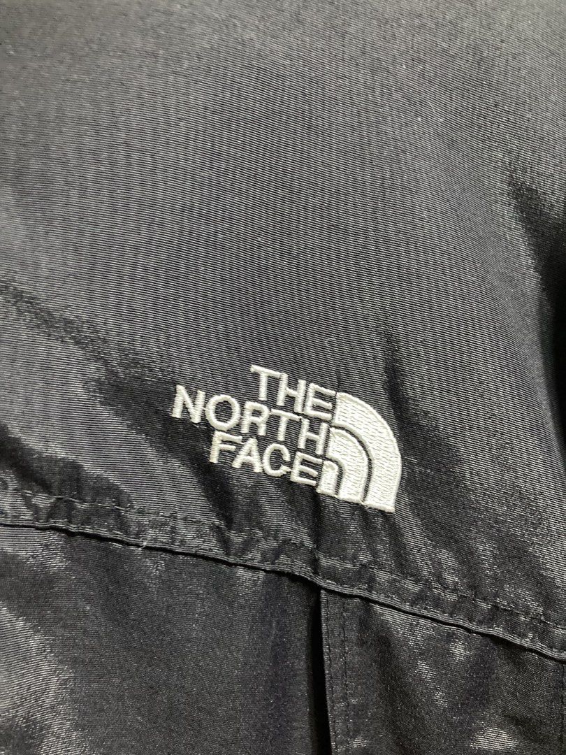 The North Face Black Hooded Jacket (Category: Coats, Jackets and Outerwear) located in Iloilo. Submitted by __kyleeee__ (Listing ID 1439916549, Image 2). Description: - Brand: The North Face - Color: Black - Style: Hooded Jacket - Features: Embroidered logo on chest and back - Material: Lightweight - Closure: Full zip - Hood: Comfortable, for added protection - Ideal for: Outdoor activities, casual wear.