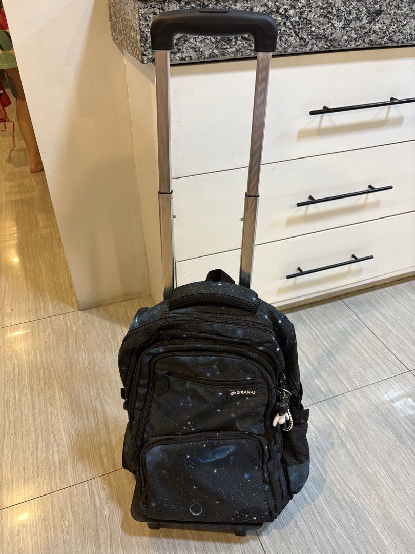 Trolley back pack (Category: Backpacks) located in Quezon City. Submitted by nadz.b (Listing ID 1439948877, Image 1). Description: Removable trolley Issue - dents on the trolley steel frame (purely cosmetic damage).