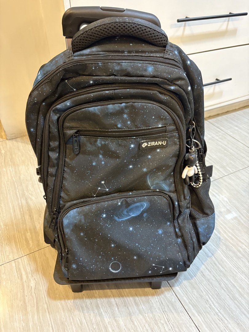 Trolley back pack (Category: Backpacks) located in Quezon City. Submitted by nadz.b (Listing ID 1439948877, Image 2). Description: Removable trolley Issue - dents on the trolley steel frame (purely cosmetic damage).