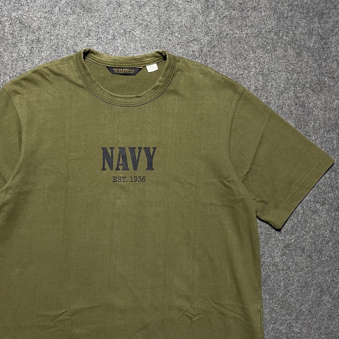 Uniform Bridge “Navy” crewneck t-shirt (Category: Tshirts & Polo Shirts ) located in Zamboanga. Submitted by rag_20 (Listing ID 1439844601, Image 2). Description: Uniform Bridge “Navy” crewneck t-shirt Uniform Bridge a South Korean heritage workwear and military-inspired label. Featuring “NAVY” stencil block lettering with an “EST. 1936” timestamp underneath, and also Small fabric branding tag stitched onto the lower right side seam. And a Heavyw