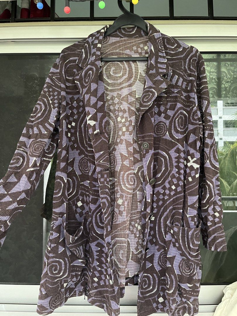 Unique Patterned Lightweight Jacket (Category: Coats, Jackets and Outerwear) located in Singapore. Submitted by mike_wazowski (Listing ID 1439912632, Image 1). Description: - Stylish jacket with unique abstract pattern - Colors: Brown and Purple - Lightweight material, ideal for layering - Two practical front pockets - Perfect for casual or semi-formal outfits - Whimsy witch core.