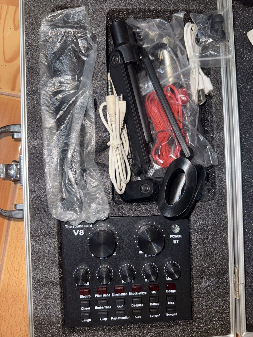 V8 Sound Card Microphone Set with Case (Category: Microphones) located in Cavite. Submitted by kdshoes (Listing ID 1439915595, Image 2). Description: - Complete V8 sound card and microphone set - Durable aluminum case for easy storage and transport - Includes adjustable microphone stand and all necessary cables - Sound card features various built-in sound effects - Ideal for live streaming, podcasting, music recording, and broadcasting .