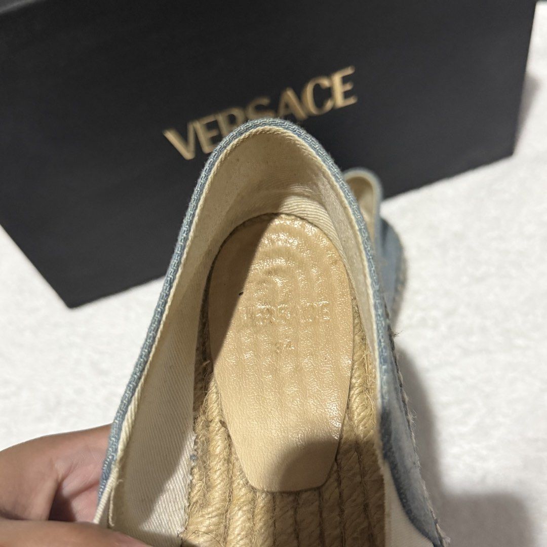 Versace Medusa Denim Espadrilles Flat Shoes (Category: Babies & Kids Fashion) located in Las Pinas. Submitted by chocolemon (Listing ID 1439986581, Image 2). Description: Size EUR 34 Authentic Versace espadrilles - Light denim wash - Iconic Medusa head embroidery on front - Classic braided jute sole - Comes with original Versace box - Ideal for stylish casual wear.