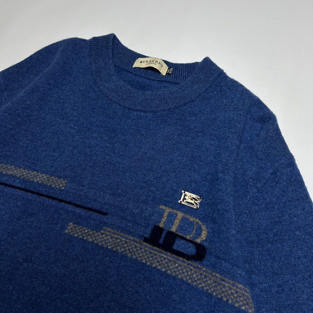 Vintage Burberry Soft Wool Knitted Sweater (Category: Tshirts & Polo Shirts ) located in Antipolo. Submitted by wvyfrnds (Listing ID 1439862971, Image 3). Description: Vintage Burberry Soft Wool Knitted Sweater Size: L Color: Blue Dimensions (Inches): Length: 29 Width: 20 Color Rate: 9/10 Issues - NONE 595 PLUS SF.