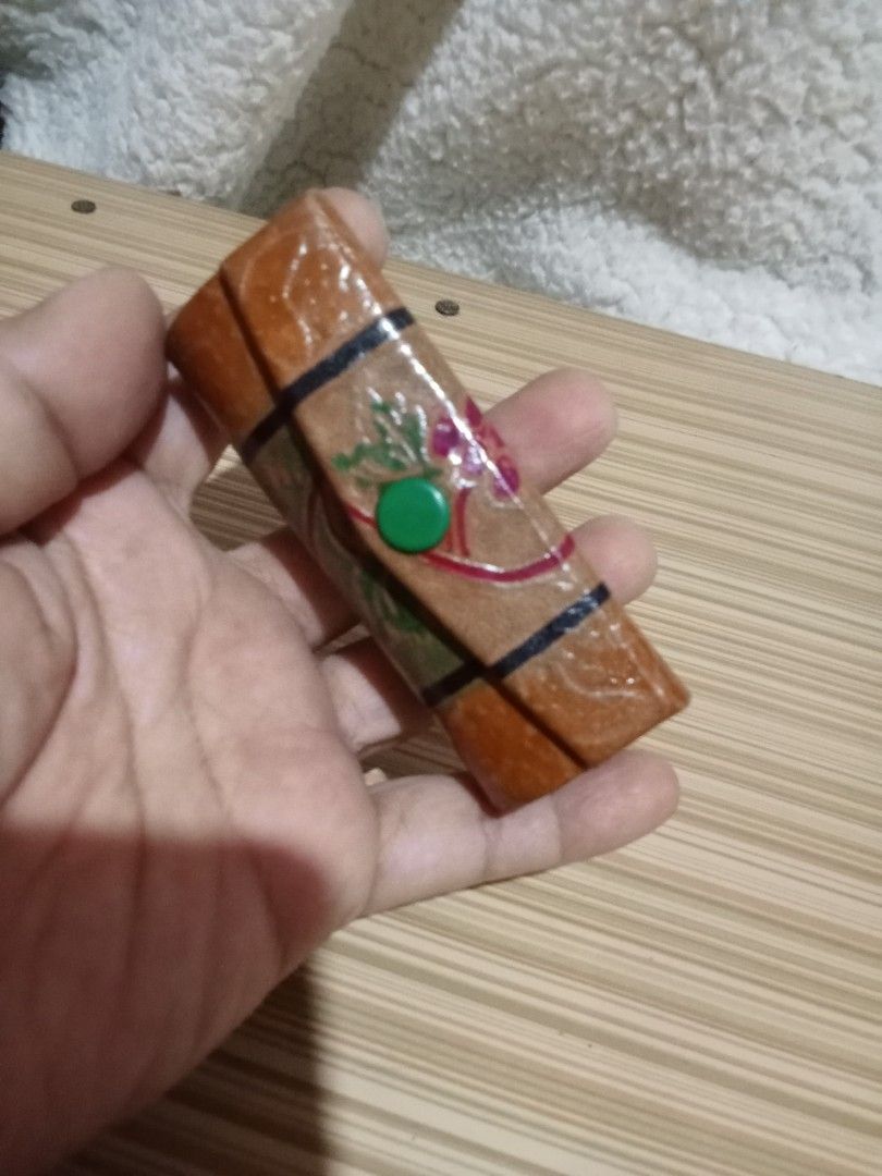 Vintage Lipstick Holder with Mirror (Category: Makeup) located in Bocaue. Submitted by marajapansurplus (Listing ID 1439915697, Image 1). Description: - Selling as it is - Beautiful embossed floral design - Secure snap closure - Built-in mirror inside - Stylish paisley fabric lining.