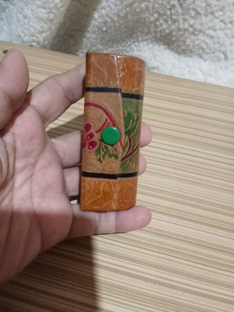 Vintage Lipstick Holder with Mirror (Category: Makeup) located in Bocaue. Submitted by marajapansurplus (Listing ID 1439915697, Image 3). Description: - Selling as it is - Beautiful embossed floral design - Secure snap closure - Built-in mirror inside - Stylish paisley fabric lining.