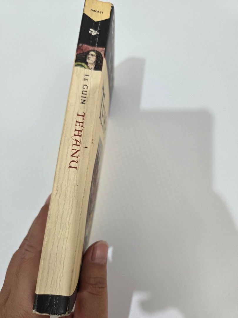 [Vintage] Tehanu by Ursula K. Le Guin (Category: Storybooks) located in Bacolod City. Submitted by maraline (Listing ID 1439914053, Image 2). Description: - Title: Tehanu by Ursula K. Le Guin - Part of the Earthsea Cycle - Cover Illustration: Dragon and woman - Condition: Pages intact and readable - Publisher: Simon & Schuster.