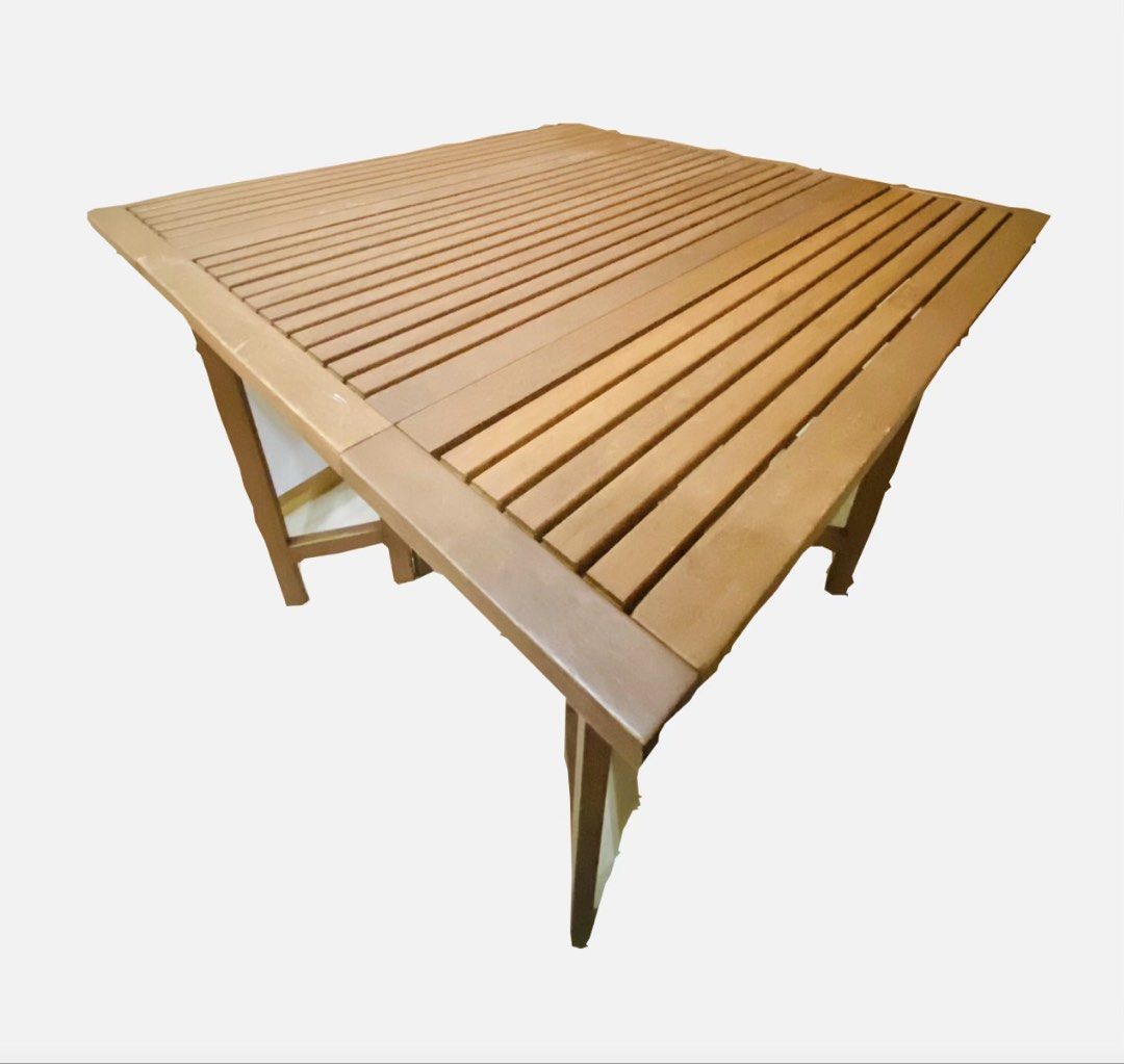 Wooden Folding Table and Chair Set (Category: Tables & Sets) located in Batangas. Submitted by chooseurpick (Listing ID 1439861194, Image 2). Description: FOR MEET UP/FREE DELIVERY: SM HYPERMARKET Balagtas, Batangas City or nearby area only - Wooden folding table and chair set - True Space-Saver: The table features a drop-leaf design, allowing it to fold down to just 19.5” wide - Integrated Storage: All 4 chairs fit perfectly inside the table bas