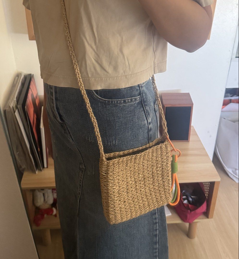 Woven Crossbody Bag with Zipper (Category: Cross-body Bags) located in Paranaque City. Submitted by migvee (Listing ID 1439853490, Image 2). Description: - Woven crossbody bag - Rectangular shape - Neutral color - Zipper closure - Adjustable long strap - Small top handle - Unique texture - Ideal for everyday wear.