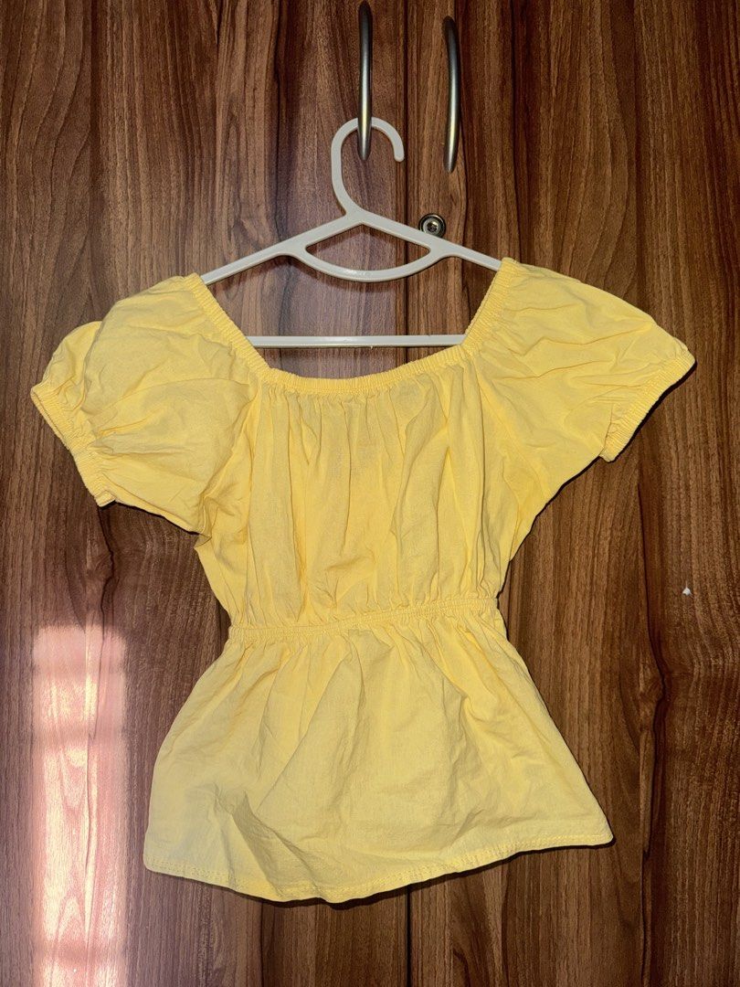 Yellow Puff Sleeve Top (Category: Blouses) located in Angono. Submitted by gentlyadoredstuff (Listing ID 1439886586, Image 2). Description: - Brand New - XS- Semi large - Puff sleeves - Peplum hem - Square neckline - Tie detail at bust.