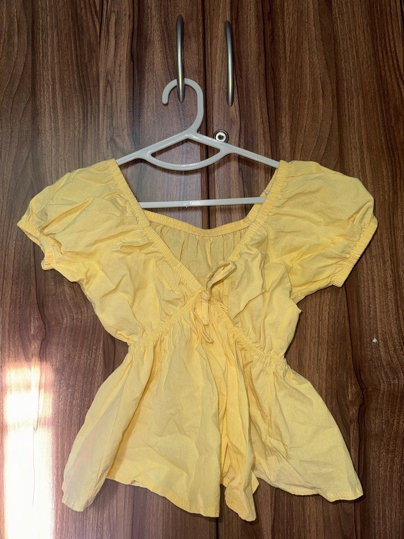 Yellow Puff Sleeve Top (Category: Blouses) located in Angono. Submitted by gentlyadoredstuff (Listing ID 1439886586, Image 1). Description: - Brand New - XS- Semi large - Puff sleeves - Peplum hem - Square neckline - Tie detail at bust.