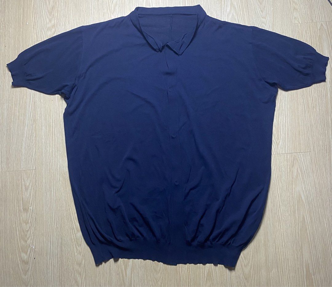 Y's by Yohji Yamamoto Navy poloshirt (Category: Luxury Apparel) located in Olongapo. Submitted by copnsold (Listing ID 1439883308, Image 1). Description: - Y's by Yohji Yamamoto navy knit shirt - Size 2 - Made in Japan - Features a collared neckline and short sleeves - Buttoned closure - Fabric: 55% rayon, 45% polyester - Care instructions: Do not bleach, tumble dry, or iron 32”Length 29”Width .