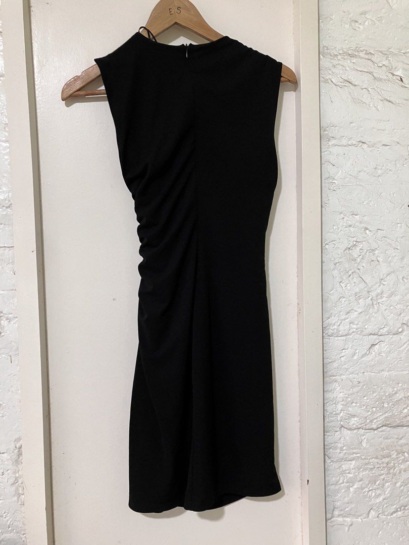 Zara Black Sleeveless Dress (Category: Dresses) located in Makati City. Submitted by rubyaltiche (Listing ID 1439852765, Image 2). Description: - Zara black sleeveless dress - Flattering ruched side detail - Size: S - Made in Turkey - Back zipper closure - Original price: "€25".