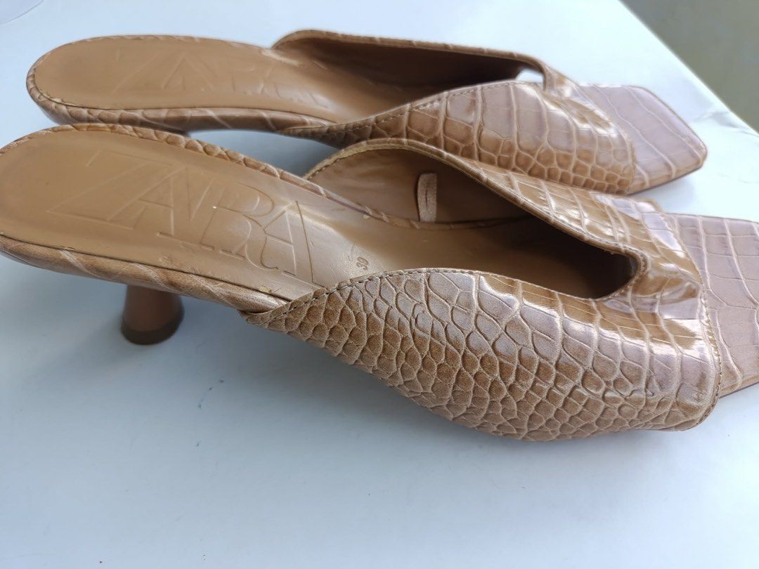 Zara Croc Embossed Square Toe Heeled Mules (Category: Flats & Sandals) located in Dasmarinas. Submitted by gelxto (Listing ID 1439991918, Image 2). Description: - Stylish heeled mules from Zara - Chic croc-embossed texture - Easy slip-on design - Trendy square toe - Comfortable block heel - Perfect for dressing up any outfit, day or night.