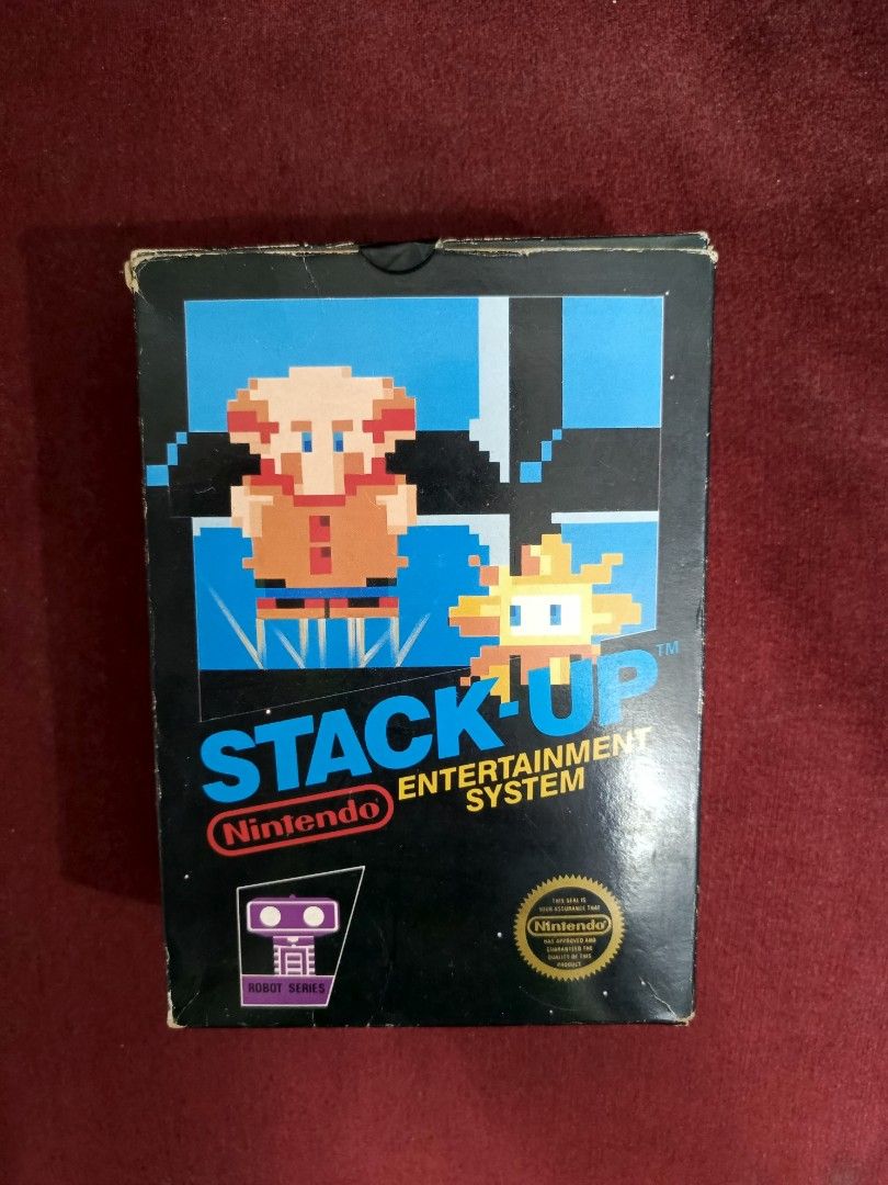 1985 Nintendo Stack-Up Entertainment System Game Box and Accessories (Category: Nintendo) located in Manila. Submitted by fiercehorse-60ca (Listing ID 1440075309, Image 1). Description: - Complete set for 1985 Nintendo Stack-Up - Includes original box and game cartridge - Comes with all accessories: 5 colored blocks (red, yellow, green, blue, white) - Includes 4 corner pieces - High-tech strategy juggling game.