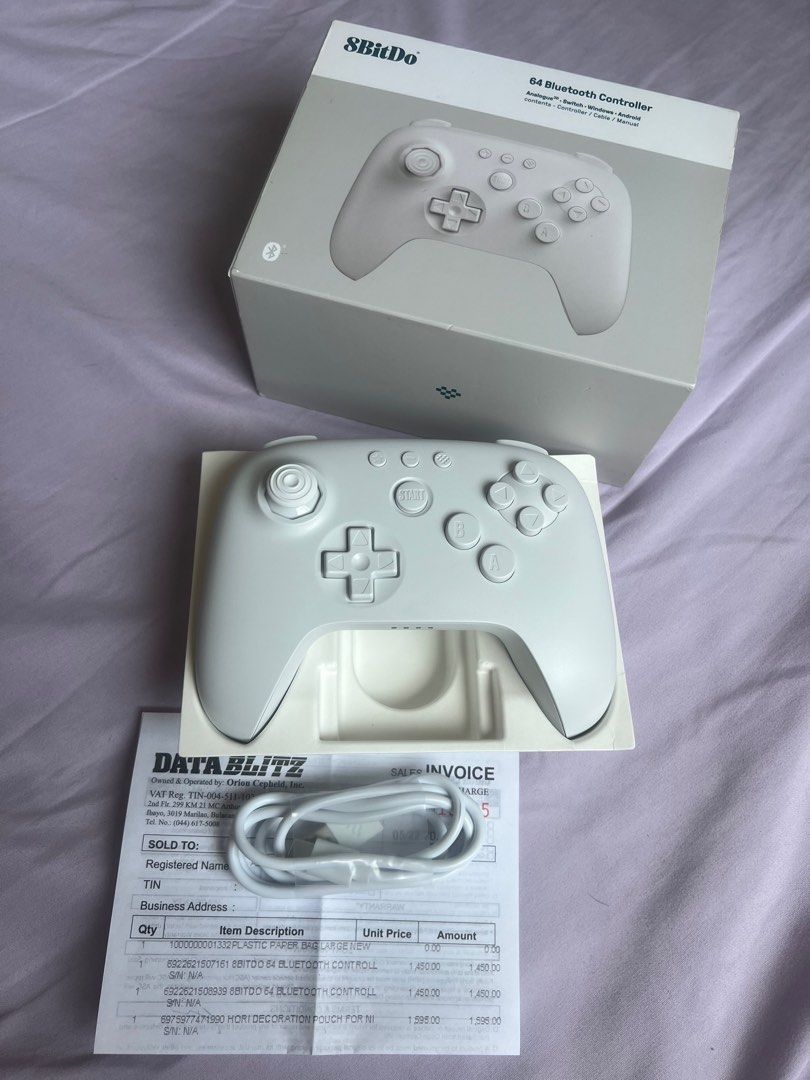 8BitDo 64 Bluetooth Controller (Category: Controllers) located in Malabon City. Submitted by hellosmileyshop (Listing ID 1440006081, Image 2). Description: -Brand New w/ Box and Accessories (wire charger) RFS: Nagkamali ng bili, wala palang X Y buttons for pokopia sa switch. Payment & Delivery Method: E-wallet (Gcash, Paymaya, Mari) Bank Transfer (UB) Lalamove (Same day delivery) GogoXpress or LBC (of outside Greater NCR) Delivery fee should be s