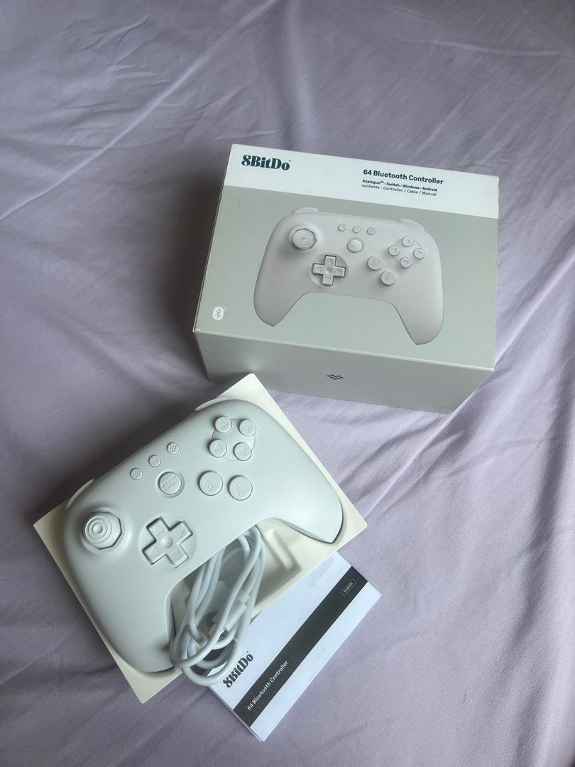 8BitDo 64 Bluetooth Controller (Category: Controllers) located in Malabon City. Submitted by hellosmileyshop (Listing ID 1440006081, Image 1). Description: -Brand New w/ Box and Accessories (wire charger) RFS: Nagkamali ng bili, wala palang X Y buttons for pokopia sa switch. Payment & Delivery Method: E-wallet (Gcash, Paymaya, Mari) Bank Transfer (UB) Lalamove (Same day delivery) GogoXpress or LBC (of outside Greater NCR) Delivery fee should be s