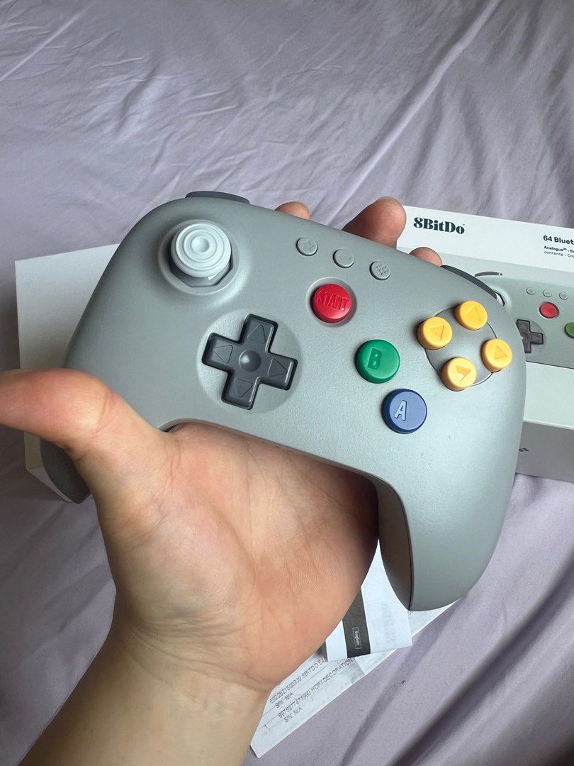 8BitDo 64 Bluetooth Controller (Gray) (Category: Controllers) located in Malabon City. Submitted by hellosmileyshop (Listing ID 1440006676, Image 3). Description: -Brand New w/ Box and Accessories (wire charger) RFS: Nagkamali ng bili, wala palang X Y buttons for pokopia sa switch. Payment & Delivery Method: E-wallet (Gcash, Paymaya, Mari) Bank Transfer (UB) Lalamove (Same day delivery) GogoXpress or LBC (of outside Greater NCR) Delivery fee shou