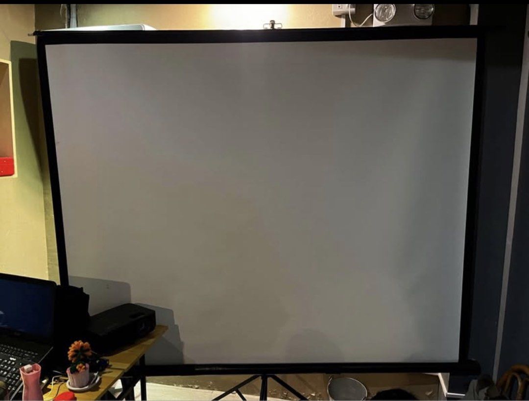 Acer Projector with Tripod Screen (Category: Projectors) located in Manila. Submitted by edmerpauli59010 (Listing ID 1440025419, Image 2). Description: - Complete home theater setup - Includes Acer projector (black, compact) - Comes with a large tripod screen - Perfect for movie nights, presentations, and gaming - Delivers immersive visuals.
