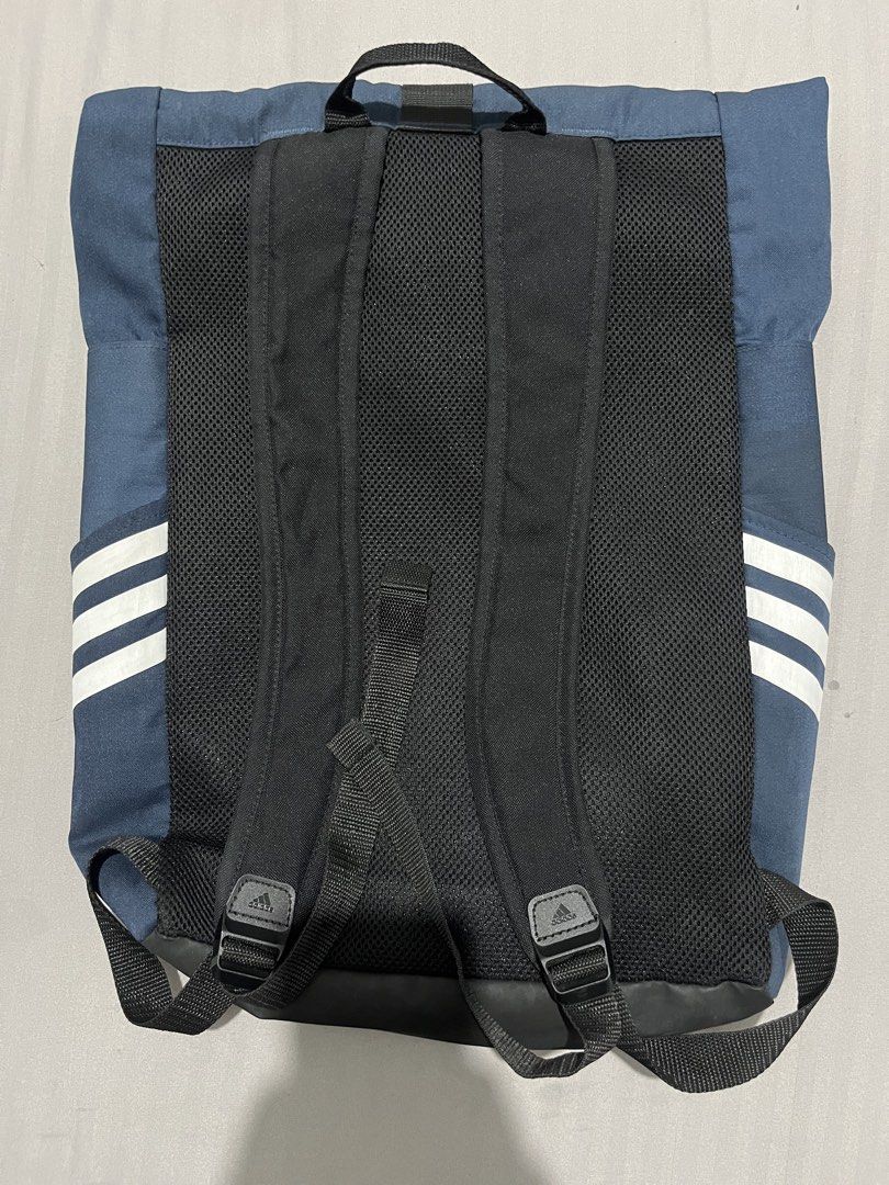 Adidas Rolltop Backpack Navy Blue (Category: Backpacks) located in Manila. Submitted by updilimangaragesale (Listing ID 1440145576, Image 3). Description: - Good condition - Has minimal stain n the front of the bag (can be washed). Other than that, no other issue :) .