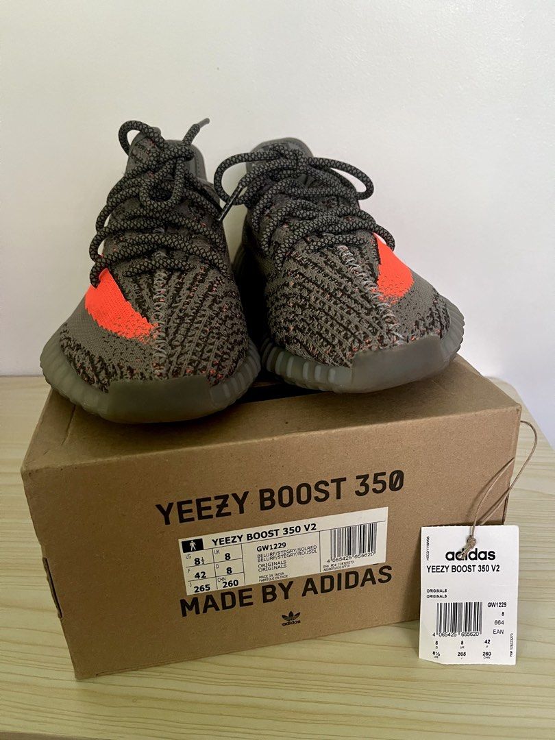 Adidas Yeezy Boost 350 V2 "Beluga Reflective" (Category: Sneakers) located in Rizal. Submitted by bautistakianne (Listing ID 1440167773, Image 3). Description: The adidas Yeezy Boost 350 V2 “Beluga Reflective” (model GW1229) is a 2021 update to the original 2016 “Beluga” colorway, featuring a grey Primeknit upper with an orange “SPLY-350” side stripe and reflective threads woven throughout for enhanced visibility. It sits on a full-length Boost m