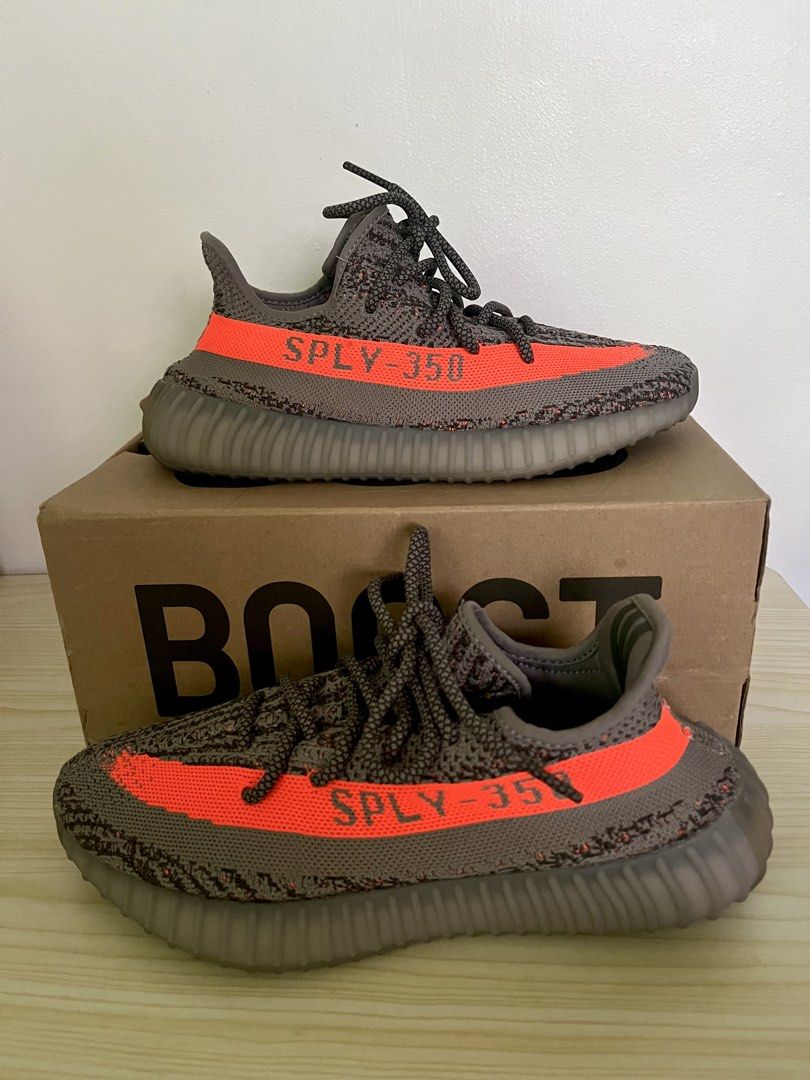 Adidas Yeezy Boost 350 V2 "Beluga Reflective" (Category: Sneakers) located in Rizal. Submitted by bautistakianne (Listing ID 1440167773, Image 2). Description: The adidas Yeezy Boost 350 V2 “Beluga Reflective” (model GW1229) is a 2021 update to the original 2016 “Beluga” colorway, featuring a grey Primeknit upper with an orange “SPLY-350” side stripe and reflective threads woven throughout for enhanced visibility. It sits on a full-length Boost m