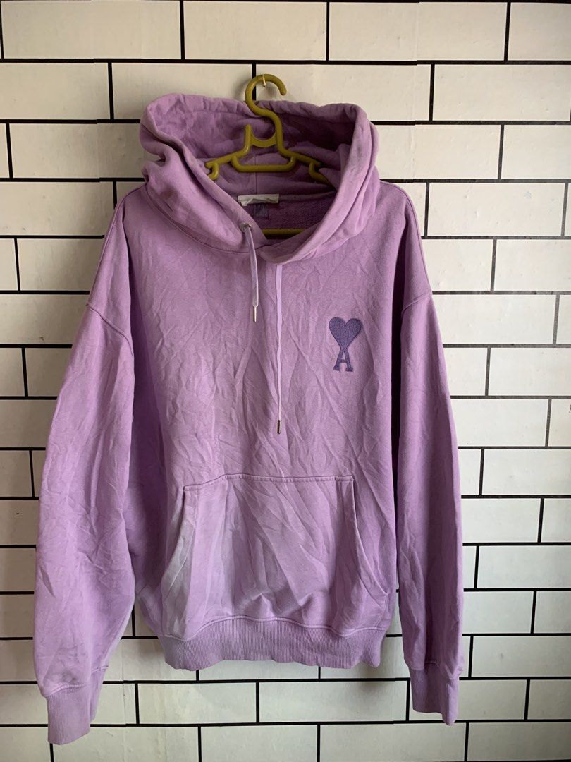AMI Purple Heart Logo Hoodie(AUTHENTIC) (Category: Hoodies) located in Manila. Submitted by pole.thirft (Listing ID 1440041576, Image 1). Description: -FIT FOR XL TO XXL - Authentic AMI Alexandre Mattiussi hoodie - Lovely lavender purple color - Signature AMI heart logo embroidered on chest - Smaller AMI logo detail on back near hood - Front kangaroo pocket - Adjustable drawstrings for hood - Made in Portugal Issue some faded part pero kaya pa na