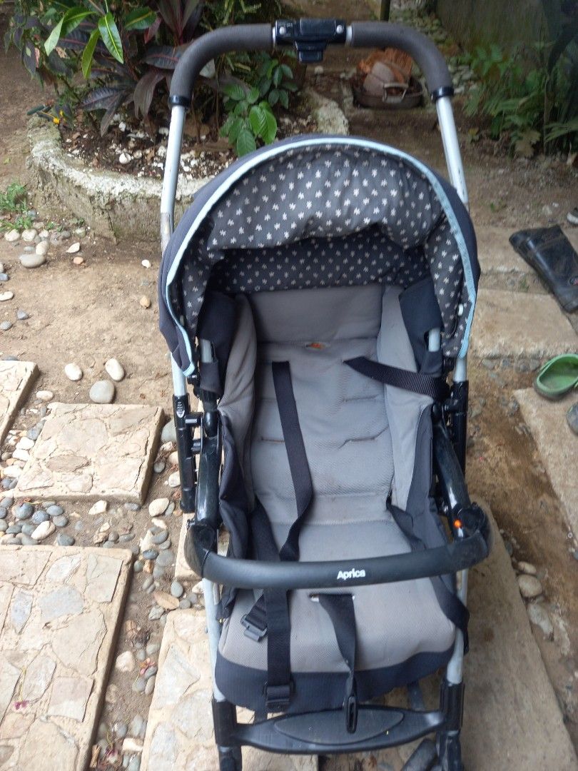 Aprica Baby Stroller (Category: Strollers) located in Manila. Submitted by miriam.11 (Listing ID 1440025890, Image 3). Description: - Lightweight and compact design, ideal for parents on the go. - Comfortable padded seat with a secure 5-point safety harness. - Adjustable canopy provides ample sun protection. - Convenient storage basket for essentials. - Smooth maneuverability to swivel wheels..