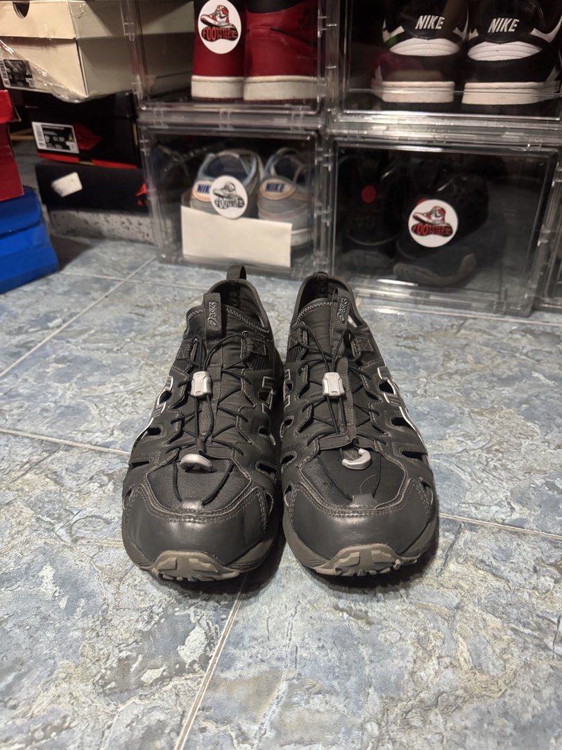 ASICS Gel Sonoma SE Aplifoam (Category: Sneakers) located in Pasay City. Submitted by vinsanity41546 (Listing ID 1440167260, Image 3). Description: - ASICS Gel-Kayano 28 sandals - Color: Dark Grey - Unique caged design - Adjustable bungee laces for a secure fit - Open construction for breathability - Ideal for active wear or casual outings - Durable sole for comfort and support.
