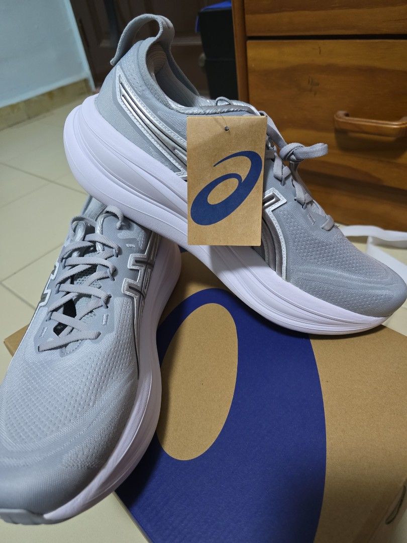 ASICS GEL-NIMBUS 28 ATC Men's Running Shoes (Category: Sneakers) located in Singapore. Submitted by clealuoyik286 (Listing ID 1440056846, Image 3). Description: - Brand new ASICS GEL-NIMBUS 28 ATC running shoes. - Color: Piedmont Grey/Pure Silver. - Size: US 11.5 (EUR 46, UK 10.5). - Ideal for running and everyday wear. - Comes with original box and packaging. - Brandon new condition..