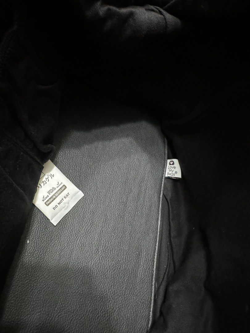 [AUTHENTIC] Givenchy Nightingale Bag (Category: Luxury Bags & Wallets) located in Santa Rosa. Submitted by rjaarmblo (Listing ID 1440153298, Image 3). Description: - Black Givenchy bag - Zipper closure - Leather interior - Givenchy label - Includes tag with code: "MA-10162" - Size tag included - Very good condition - Includes base shaper and pillow stuffer - Flaws: Creases sa handles but no peeling.