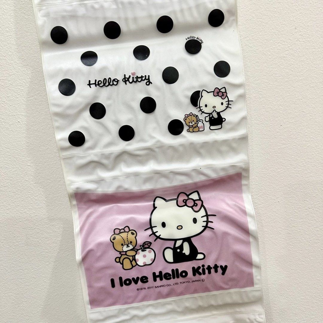 [Authentic] Hello Kitty Wall Pocket Organizer Hanging Storage (Category: Storage Boxes & Baskets) located in Quezon City. Submitted by brandedusagoodies (Listing ID 1440156715, Image 3). Description: Authentic Sanrio Hello Kitty wall pocket organizer featuring a classic black-and-white polka dot design with pink accents and Hello Kitty artwork. A cute and functional storage piece for organizing photos, stationery, accessories, and small items whi