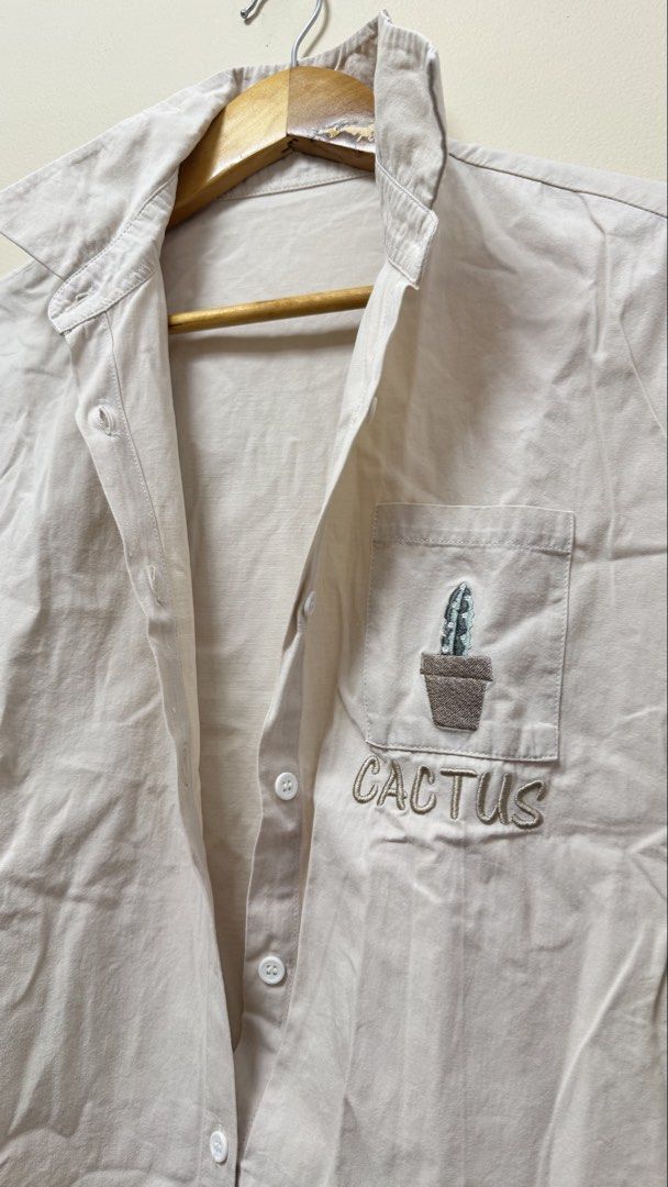 Beige polo/cover up with embroidered cactus (Category: Others Tops) located in Manila. Submitted by a_raine (Listing ID 1440126340, Image 2). Description: good as new, used once only size S-XL 📍marilao area.