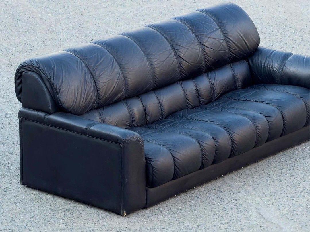 Black Leather Tufted Sofa Couch (Category: Sofas) located in Valenzuela. Submitted by upcycle_things (Listing ID 1440106212, Image 1). Description: - Stylish black leather sofa - Unique tufted design - Deep cushioning for ultimate comfort - Sleek, modern aesthetic - Ample seating space, perfect for living rooms or lounges.