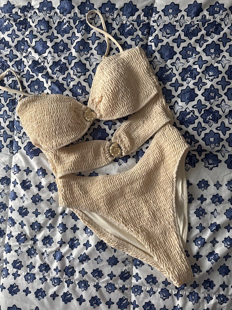 Blackbough Smocked One Piece (Category: Bikinis & Swimsuits) located in Manila. Submitted by declutters137 (Listing ID 1440079691, Image 1). Description: - Smocked texture for ultimate comfort and style - Adjustable straps on the top for a perfect fit - Cute shell details at the bust - Flattering high-waisted bottoms -never worn. Not washed, plastic still intact. Unfortunately i have removed the tags - RFS: not flattering on me -original price bo