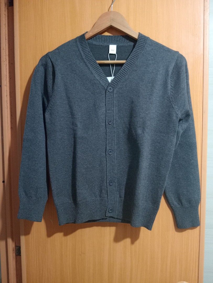 Brand new Dark Gray Cardigan Small (Category: Coats, Jackets and Outerwear) located in Manila. Submitted by cenasells (Listing ID 1440173967, Image 1). Description: Brand new Cardigan With hangtag Size on tag : 10 Year old ( fit to petite small - Med adult ) LP Posted Width : 17 inches Length : 21 inches Fabric : Thick soft cotton Color : Dark Gray.