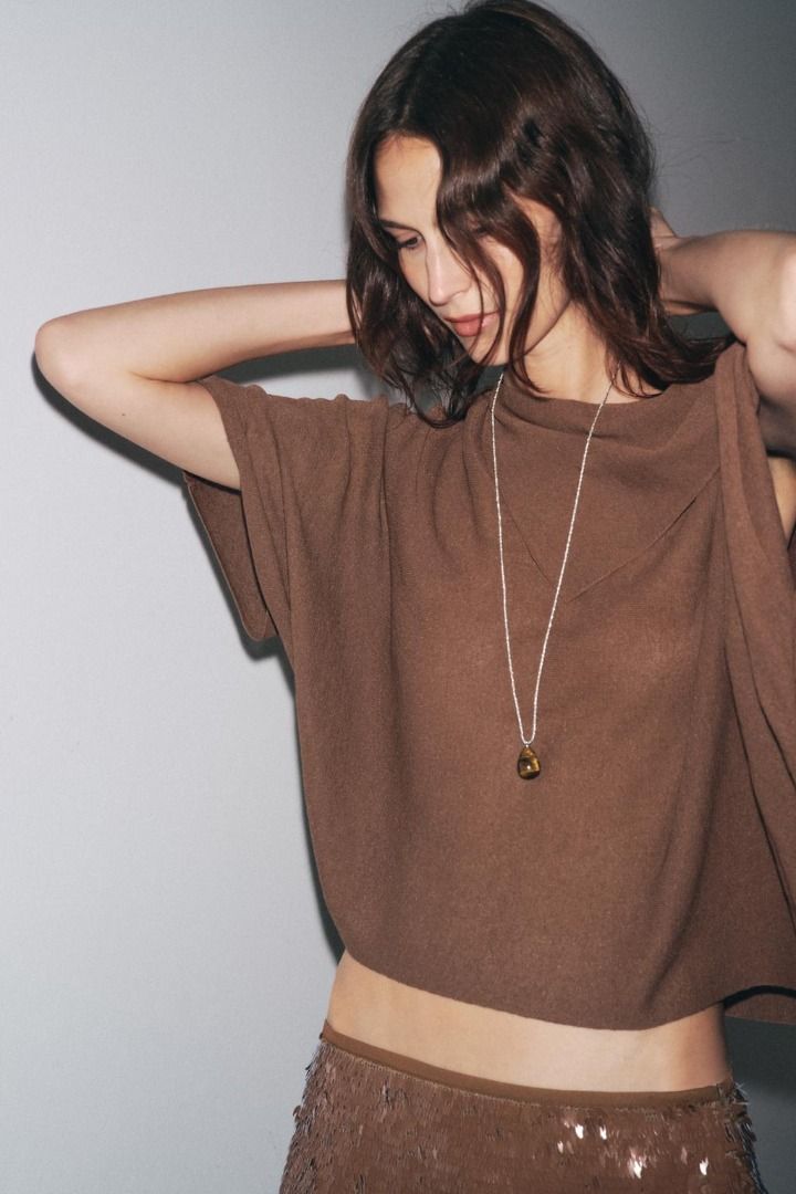 Brown chic zara top (Category: Blouses) located in Manila. Submitted by closellt (Listing ID 1440149285, Image 2). Description: - Brown fold over poncho top - Super chic top - fits xs-small mop: gcash mod: sdd or jnt tags: zara, mango, bershka, stradivarious, pull & bear, h&m, massimo dutti.