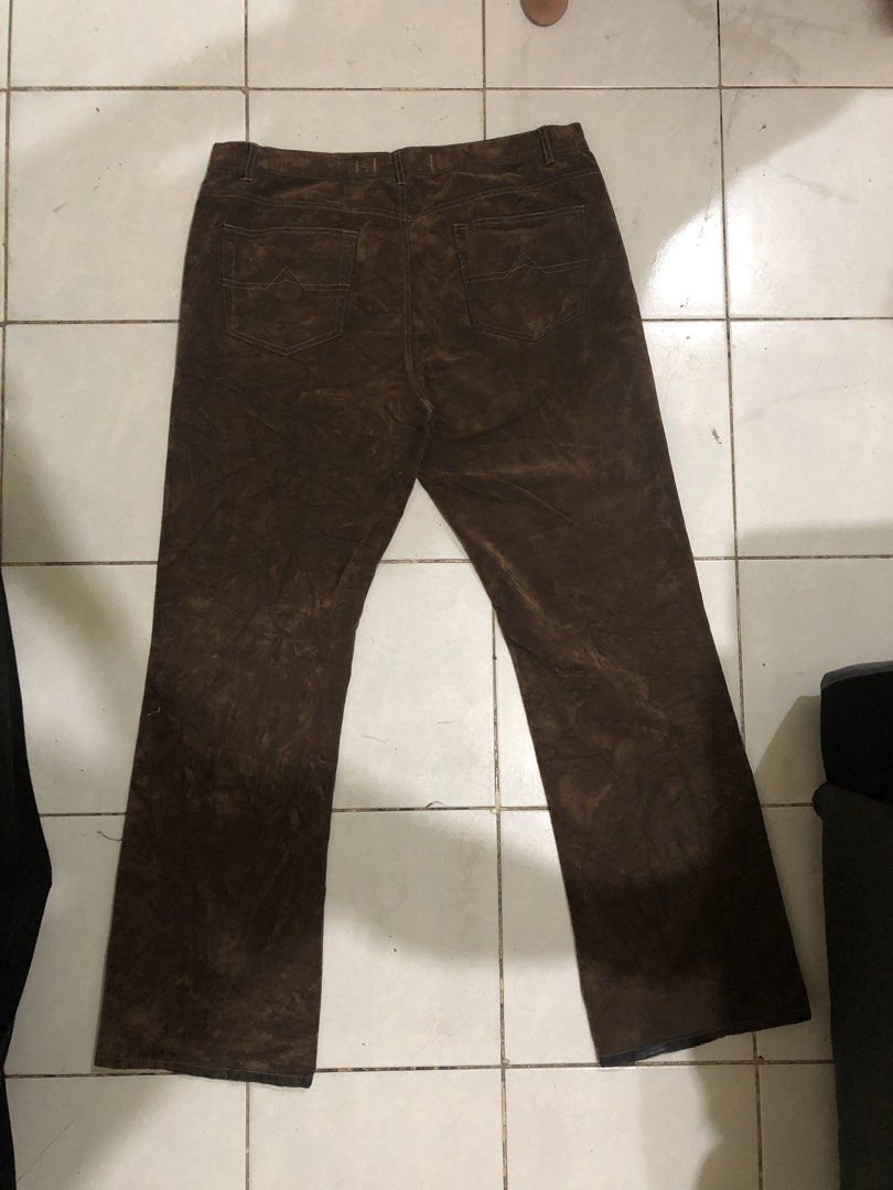 Brown Flare Jeans (Category: Jeans) located in Manila. Submitted by fleis.it (Listing ID 1440042095, Image 2). Description: - Textured brown flare jeans - Classic five-pocket design - Button and zip closure - Stylish flared leg silhouette - Perfect for casual, fashionable outfits.