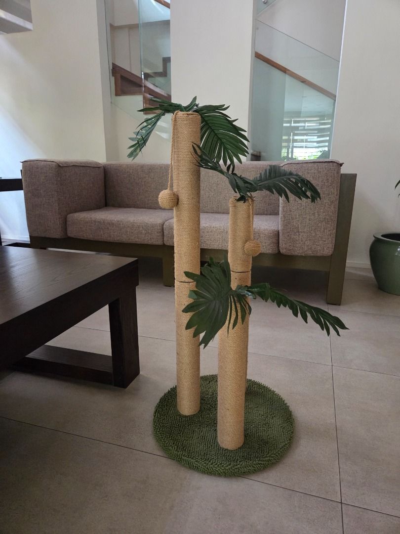 Cat Scratching Post (Category: Homes & Other Pet Accessories) located in Quezon City. Submitted by adrian55555 (Listing ID 1440034125, Image 3). Description: Cat Scratching Post Good condition Post 1: 81 cm height Post 2: 61 cm height Post 3: 41 cm height Base: 40 cm diameter 2 posts have a string and ball Base is covered in green cloth RFS: not stable enough for our cat.