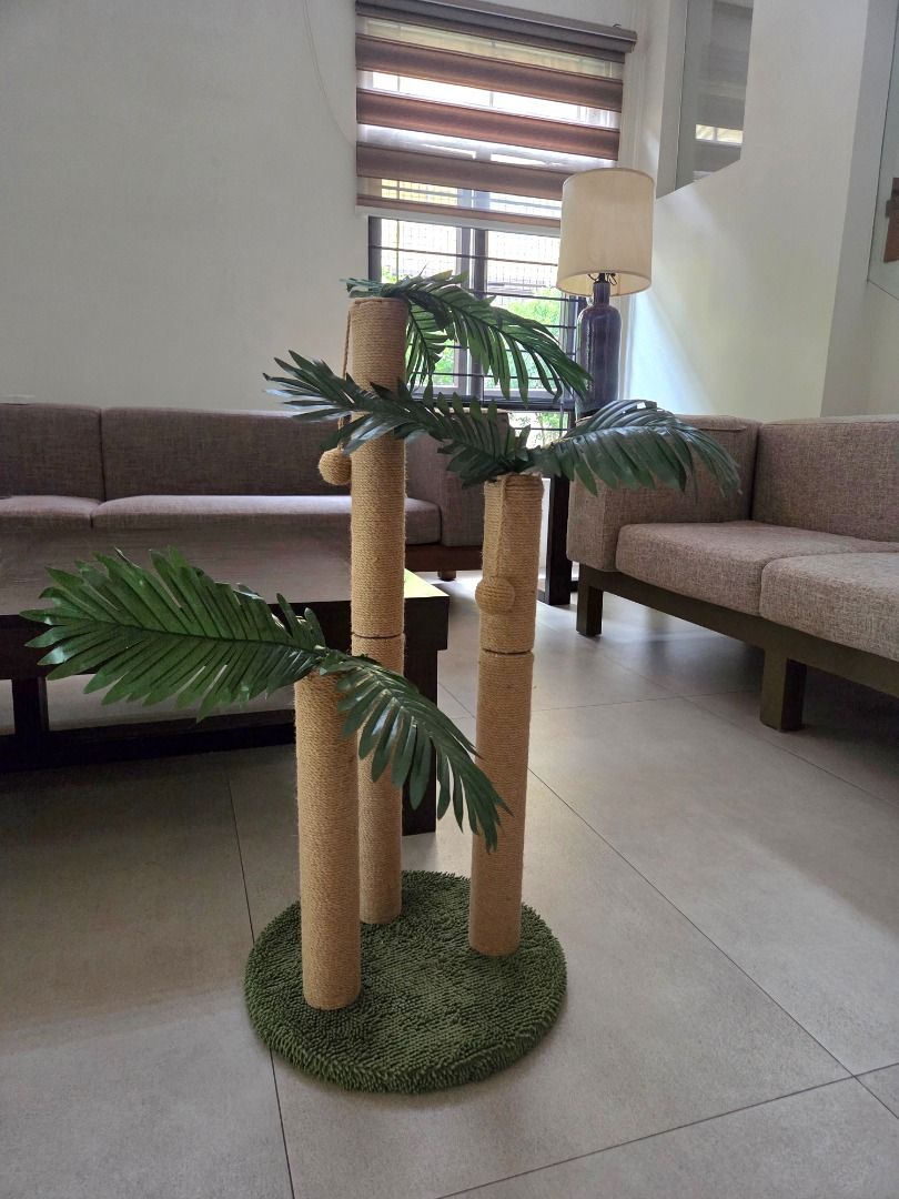 Cat Scratching Post (Category: Homes & Other Pet Accessories) located in Quezon City. Submitted by adrian55555 (Listing ID 1440034125, Image 2). Description: Cat Scratching Post Good condition Post 1: 81 cm height Post 2: 61 cm height Post 3: 41 cm height Base: 40 cm diameter 2 posts have a string and ball Base is covered in green cloth RFS: not stable enough for our cat.
