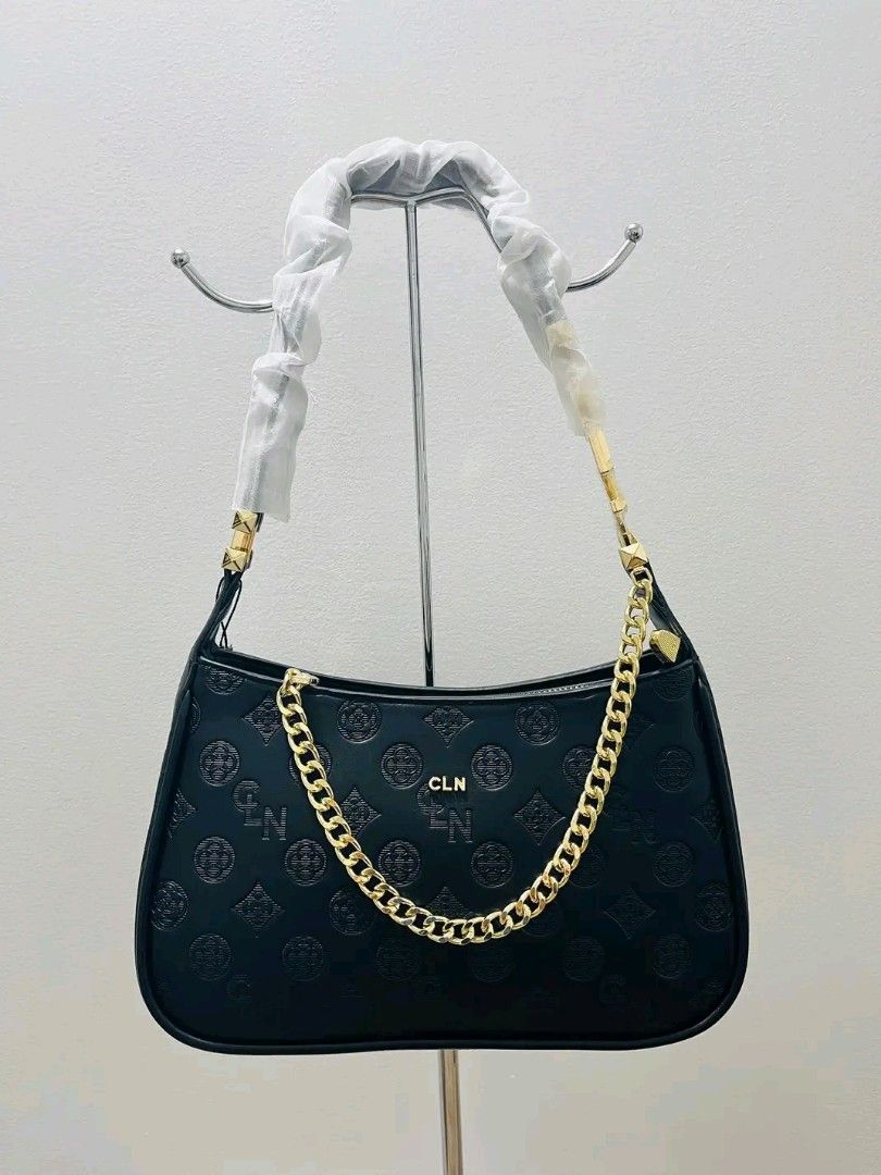 CLN Black Monogram Shoulder Bag with Gold Chain (Category: Shoulder Bags) located in Manila. Submitted by cassy0597 (Listing ID 1440005872, Image 1). Description: - Stylish black shoulder bag from CLN - Features all-over embossed monogram pattern - Chic gold chain strap - Secure closure - Spacious interior for essentials - Perfect for everyday or night out.