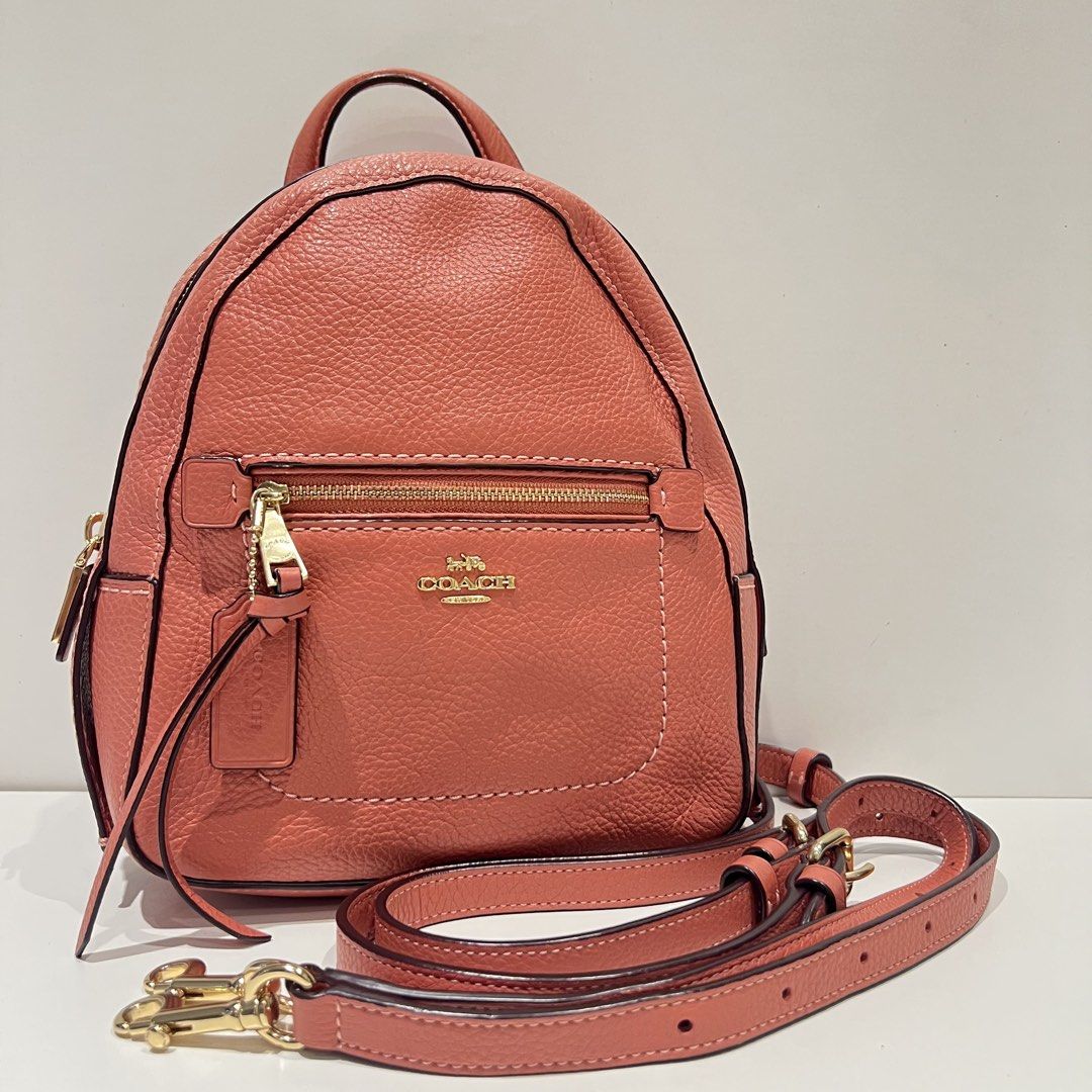Coach Andi Mini pink Backpack (Category: Luxury Bags & Wallets) located in Paranaque City. Submitted by missb1001 (Listing ID 1440145676, Image 1). Description: Authentic 💯 Overall condition: 9.5/10 Salmon pink leather body Gold hardwares Issue: small chip on bag’s creed Dimensions: 7.5in L x 9.5in H .