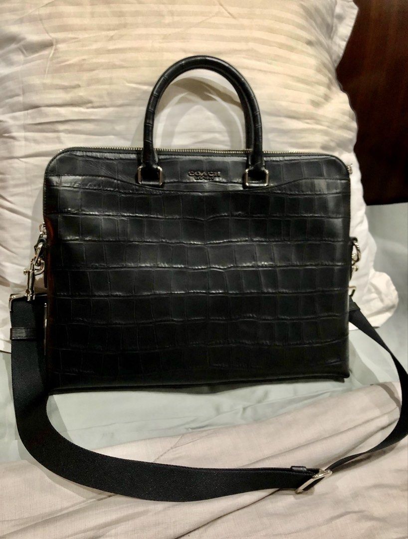 Coach Black Crocodile Embossed Leather Briefcase Bag (Category: Luxury Bags & Wallets) located in Cabanatuan. Submitted by prelovedtrinkets2023 (Listing ID 1440118638, Image 1). Description: - original coach bought in USA - Stylish black Coach briefcase - Genuine crocodile embossed leather - Dual top handles - Detachable crossbody strap for versatile carrying - Secure zipper closure for main compartment - Ideal for professional use or travel.