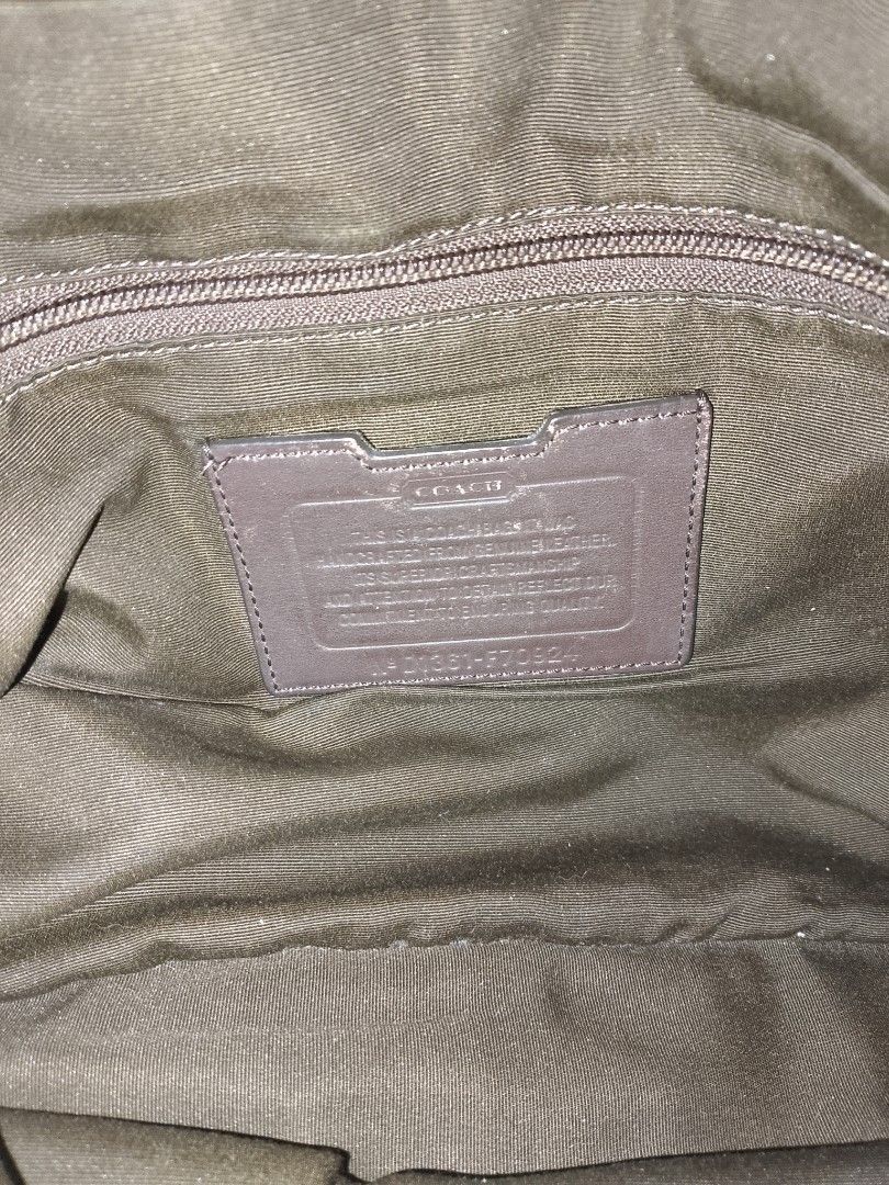 Coach Brown Leather Messenger Bag (Category: Luxury Bags & Wallets) located in Quezon City. Submitted by tracermarky (Listing ID 1440188845, Image 3). Description: - Authentic Coach messenger bag - Rich brown pebbled leather - Black trim and adjustable black strap - Interior with multiple compartments for organization - Stylish and practical for everyday use.